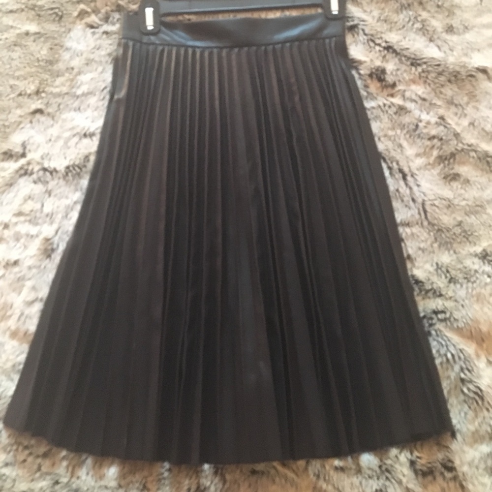 Faux leather pleated skirt.